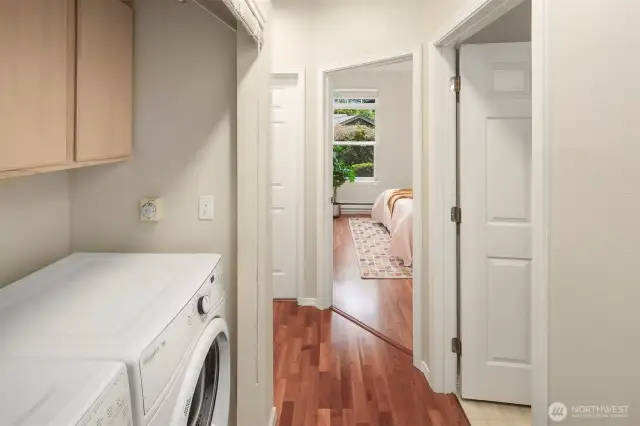 A large hallway closet houses your full sized washer/dryer. So convenient!