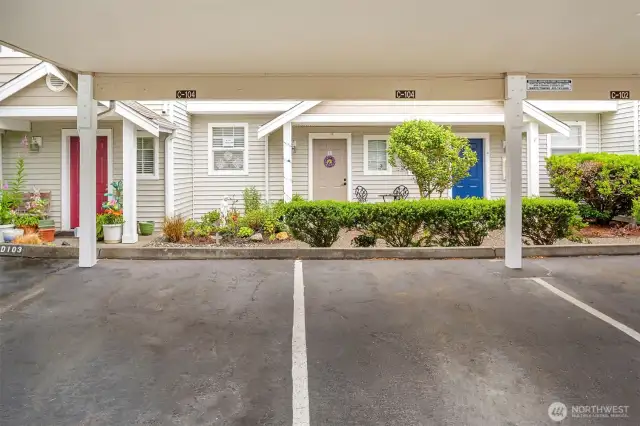 TWO carport spaces just outside the walkway to your home.