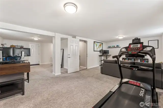 Large rec room on the lower level. TALL CEILINGS too! 87". (7' 3")