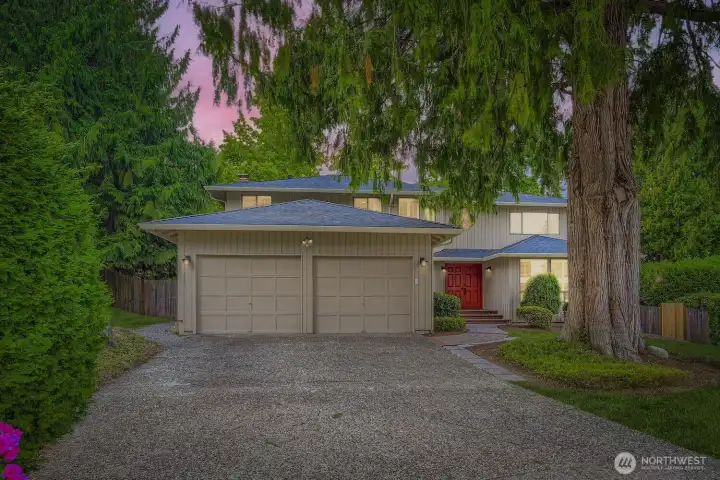 Welcome home to a lovely two story surrounded by manicured landscaping and just the right number of majestic trees.