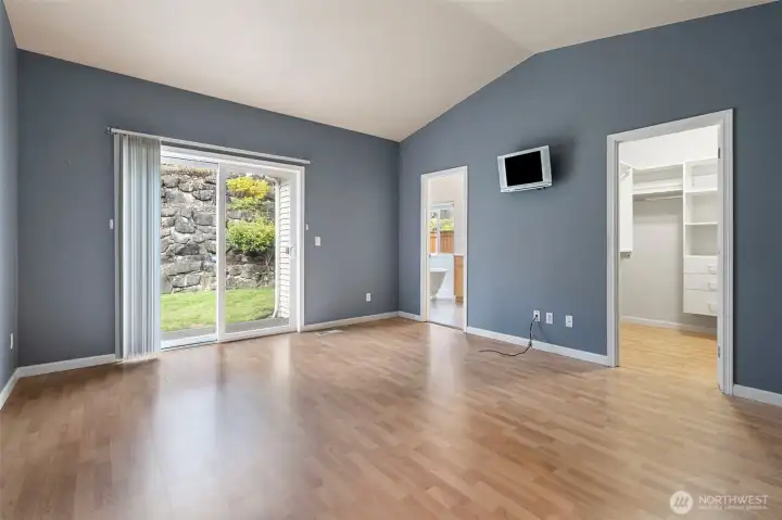 Primary bedroom with access to private backyard!