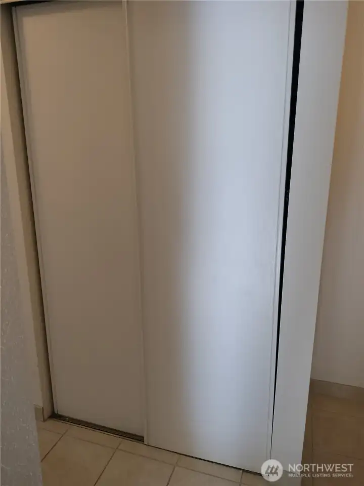 Ad you walk in, the clothes closet is on your right.