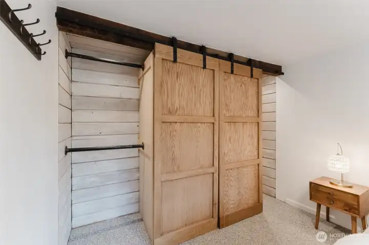 Impressive full-wall custom storage maximizes space and keeps everything well organized.