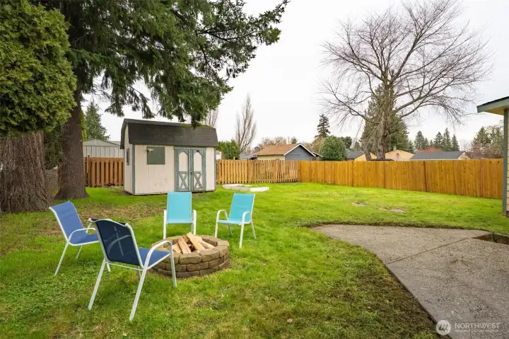 Fully fenced backyard with room for gardening, play, or outdoor entertaining.