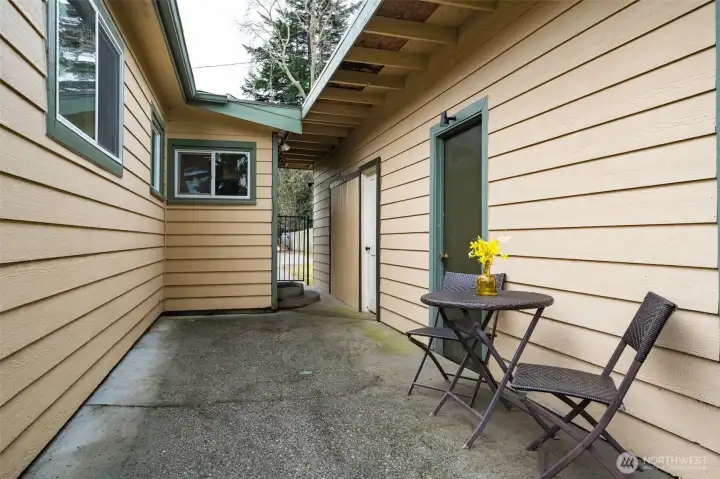 Private side patio—ideal for morning coffee or a small outdoor seating area and easily connects to the house.