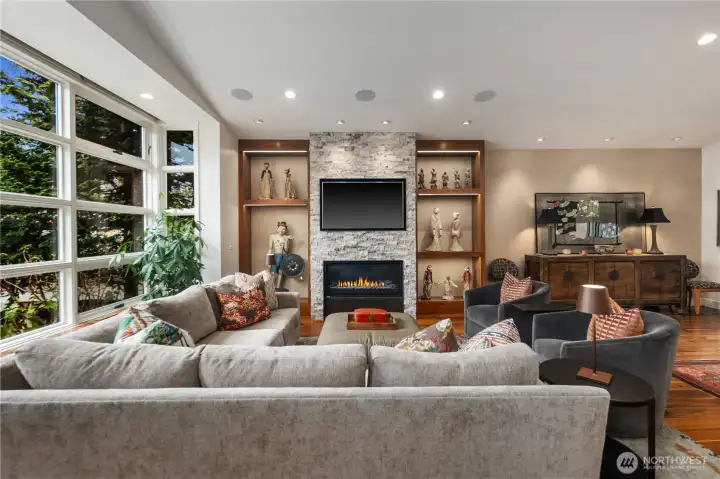 Straight-on view of the main seating area & fireplace.