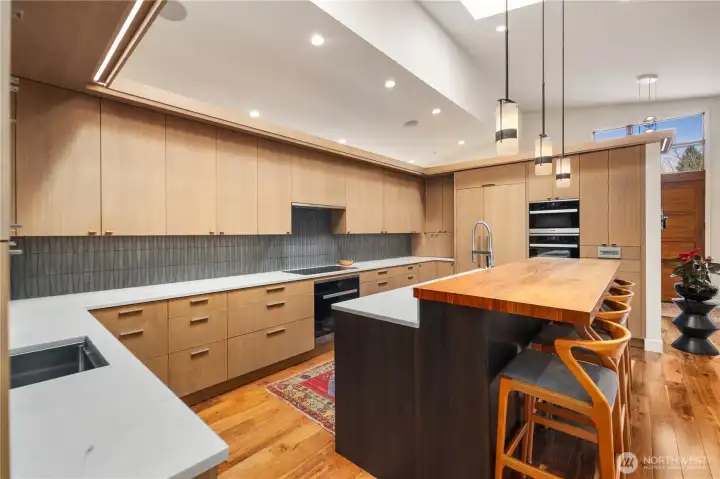 Quartz couonters, all Meile appliances, counter seating for 4...