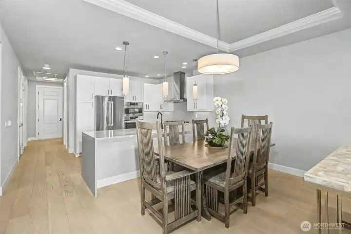 Dining area flows effortlessly into the kitchen, ideal for everyday living and entertaining.