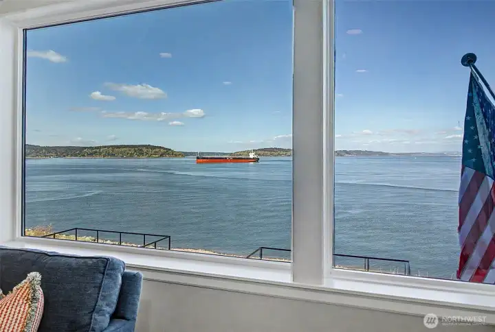 Expansive windows capture ever-changing waterfront scenery from the comfort of home.