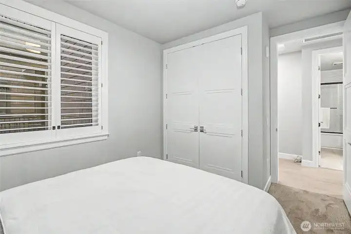 Comfortable secondary bedroom or flexible space for guests or office use.