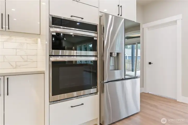 Built-in double oven and LG French door refrigerator