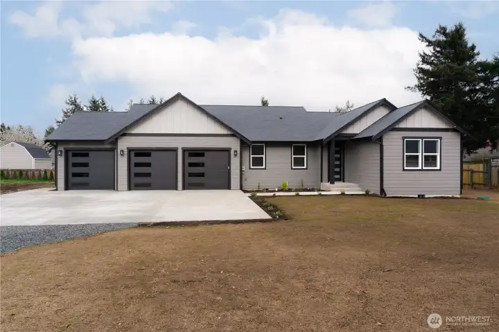 Lot is seeded with new grass coming in quick!