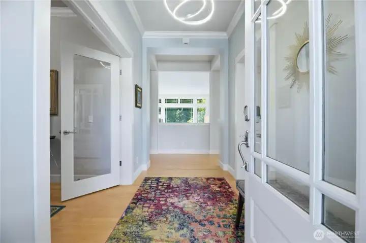 Grand entry with hardwood floors, vaulted ceilings, gorgeous millwork and high end finishes throughout