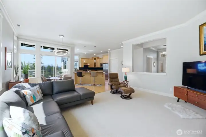 Large living room opens to dining and kitchen