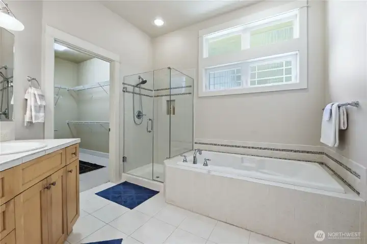 Primary bath with large soaker tub, walk-in shower