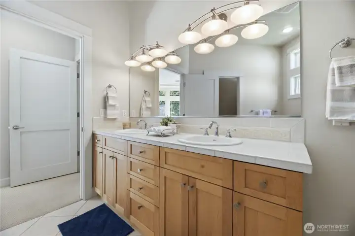 Primary bath with double sinks and vanities