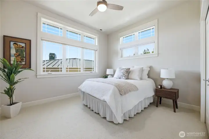 Spacious Bedroom 2 with vaulted ceilings and tons of natural light