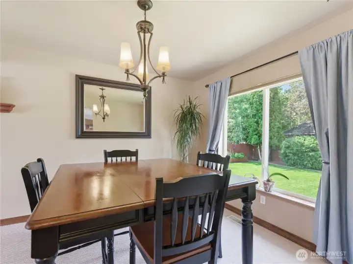 Dining area just off the front living room kitchen making sit down dinners a part of everyday. Dining area just off the front living room kitchen making sit down dinners a part of everyday.