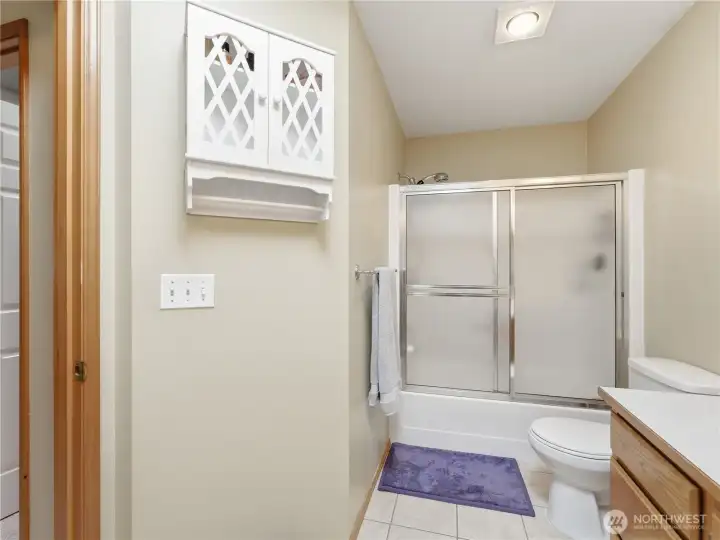 With the tub located at the end of the bathroom, it makes it easy for two to be getting ready at the same time With the tub located at the end of the bathroom, it makes it easy for two to be getting ready at the same time