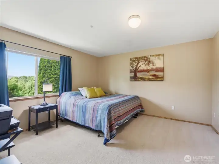 The second bedroom has tons of space with a queen size bed and side table giving room for a dresser or desk The second bedroom has tons of space with a queen size bed and side table giving room for a dresser or desk