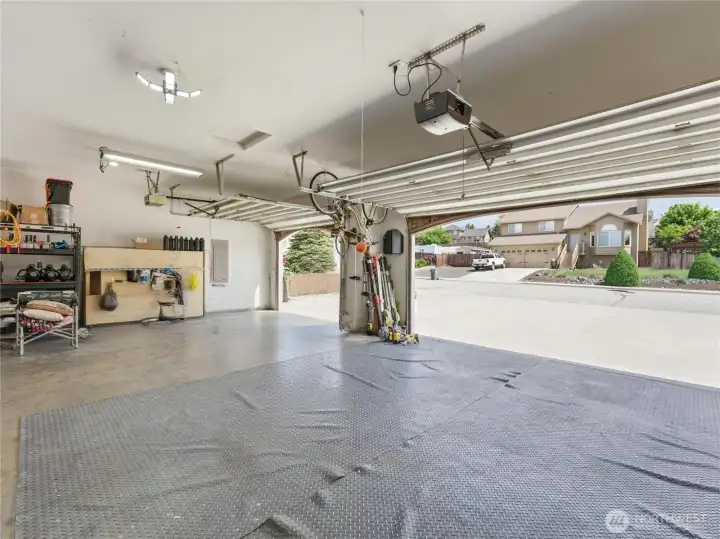 The three car garage has room for your cars and toys The three car garage has room for your cars and toys