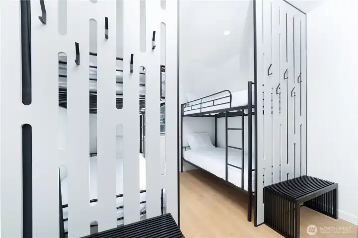 Bunk room option with one additional bed in this model. This space is smaller in this model than the photo.