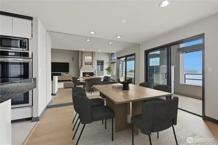 Beautiful dining area that 6-8 guest comfortably for ultimate entertaining with sliders to the private view balcony to dine by sunset. Beautiful dining area that 6-8 guest comfortably for ultimate entertaining with sliders to the private view balcony to dine by sunset.