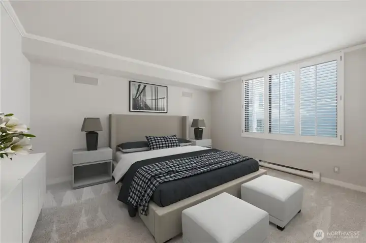 Primary suite with custom wood shutters leads to walk-in closet & sumptuous primary full bath. Primary suite with custom wood shutters leads to walk-in closet & sumptuous primary full bath.