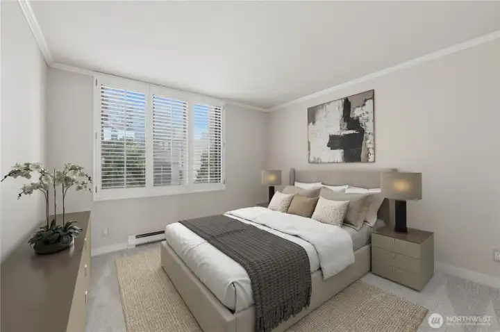 Nice size guest bedroom with custom wood shutters. Nice size guest bedroom with custom wood shutters.
