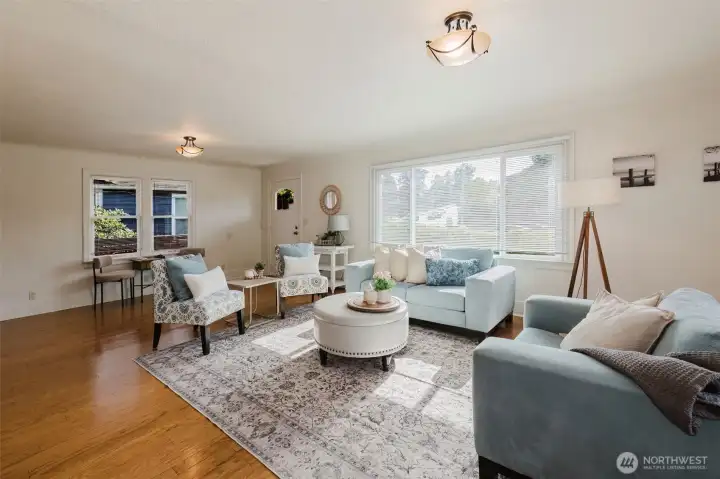 Large living room with large window and built ins