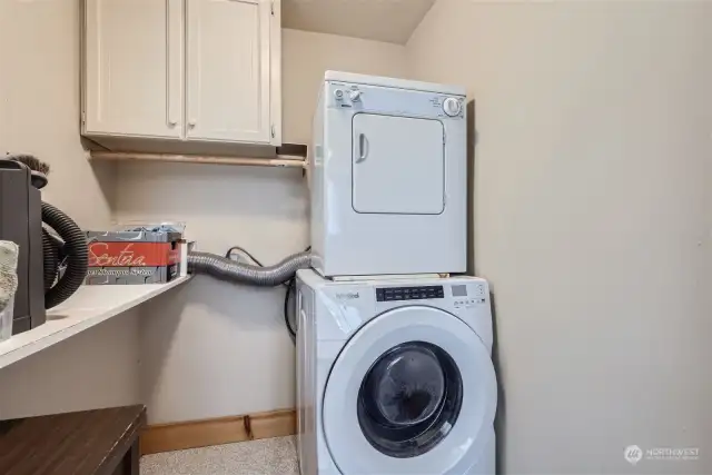 Laundry room with shelving for folding as well as plenty of room to store your supplies.