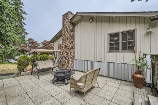 Lots of room for social gatherings on this entertainment sized stone patio and adjoining deck. Easy access to the kitchen.