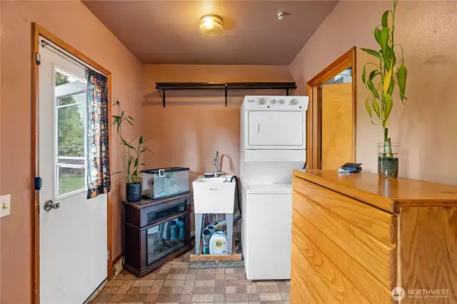 laundry room with room for stackable or sidexside washer dryer