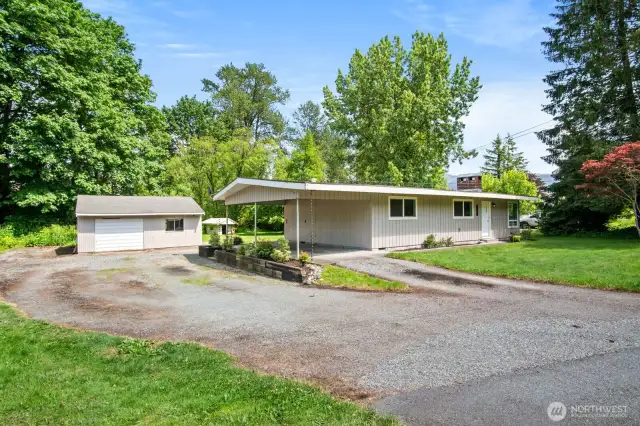 RV parking and detached garage with shop space