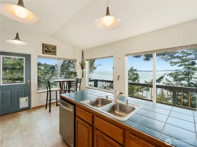 The back door leads around to the front deck & fenced-in area.
