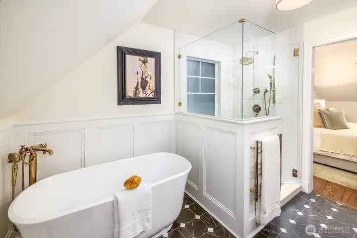 Designer Perlato Sona Soaker Tub soaking tub with Kohler fixtures.