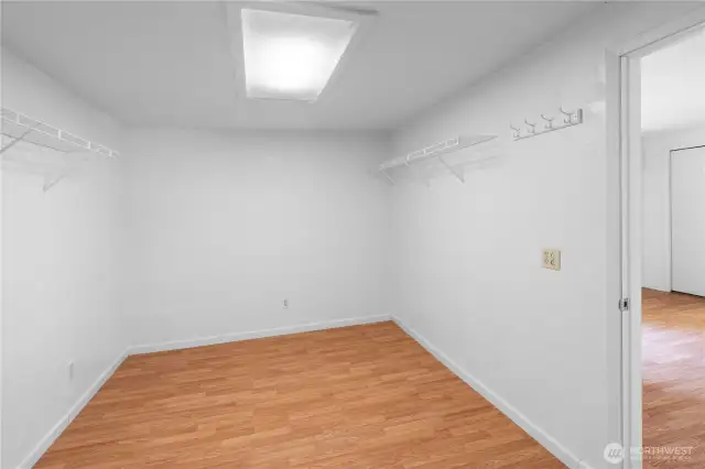 The large walk in closet makes a great storage space, and has access from both the bonus room and the great room.