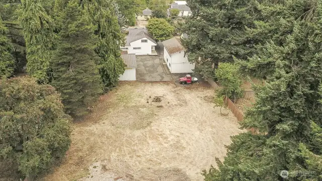 Back part of the property is a flat area and 118 x 100 ft.