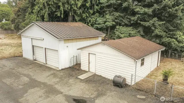 The garage/shop on the left is 20 x 30 and the smaller one on the right is 20 x 25.