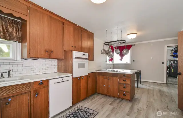 Very large kitchen with eating space and dining area.