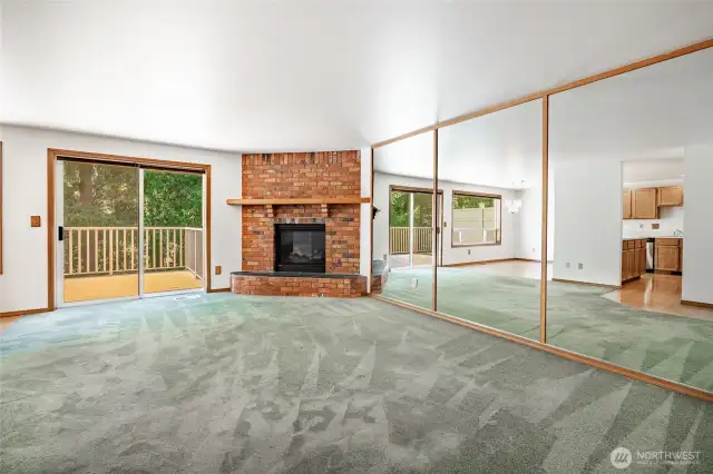 Living room leading to large deck