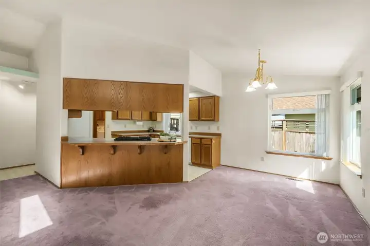Bartop @ kitchen, tons of cabinet space including a bonus pantry and a large eating area