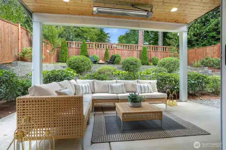 There's a large wall of windows looking out to the covered, heated patio.