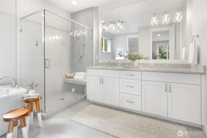 Luxurious Primary bath is a perfect place to unwind.