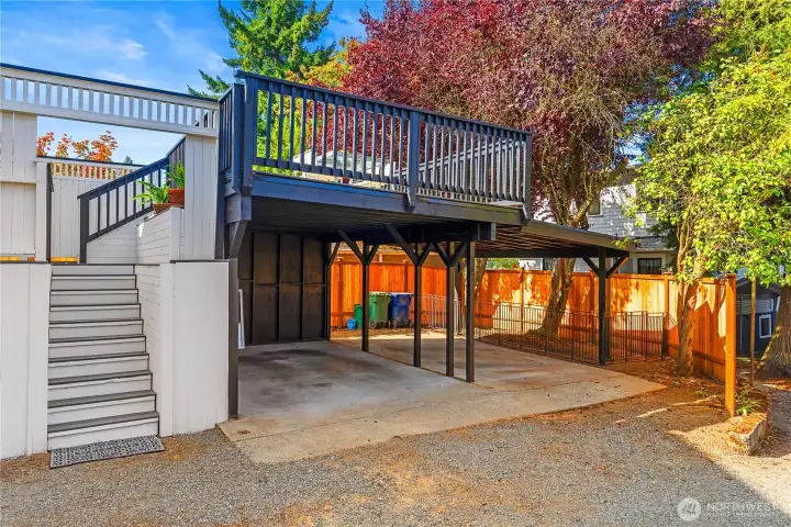 Carport for 2 cars & 2 additional parking spaces