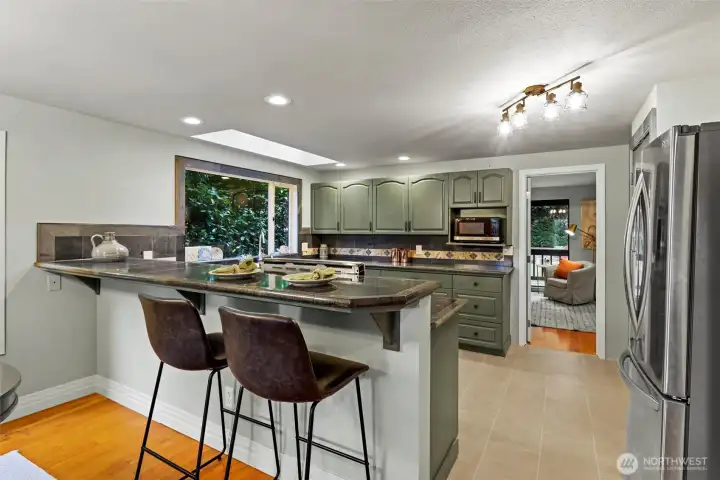 A long bar gives the chef company!