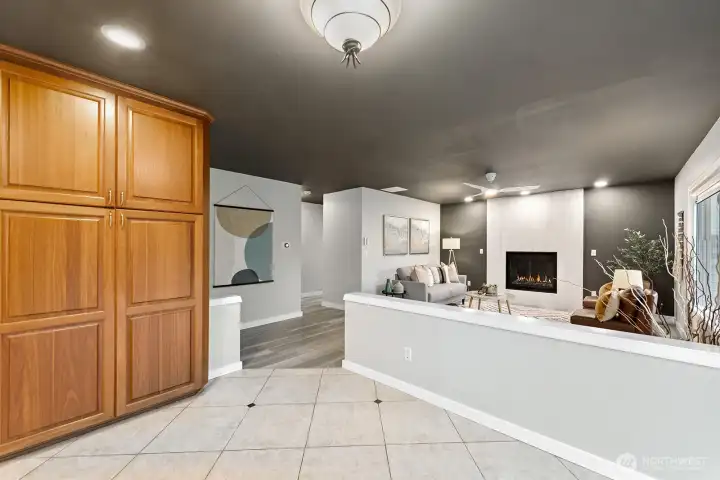 Effortless flow from kitchen to living room with generous built-ins.