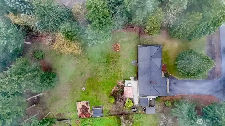 This sprawling one acre lot has a fully fenced backyard. There's plenty of space in this private oasis.