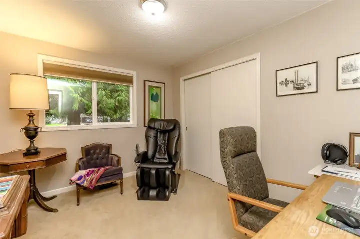 The third bedroom is currently being used as office space. Open the window and let the sounds of nature sooth you while you work.