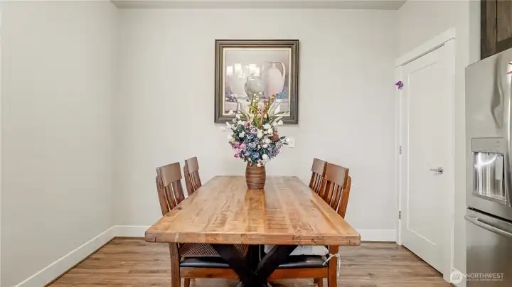 Charming dining nook sits just off the kitchen, offering comfort and convenience.
